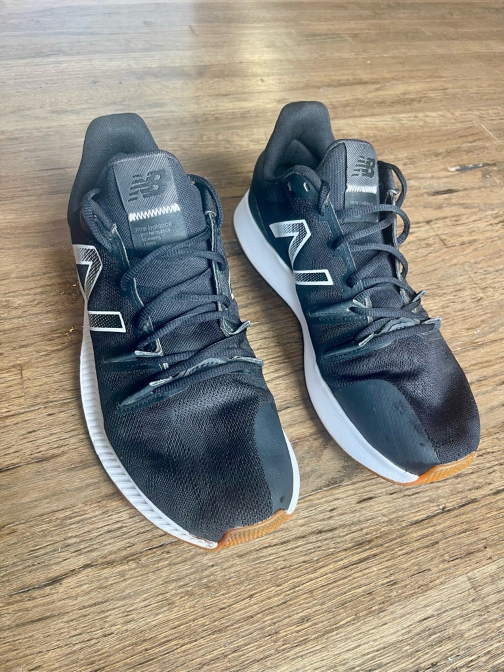 New Balance Black Sneakers with White Midsole and Brown Gum Toe